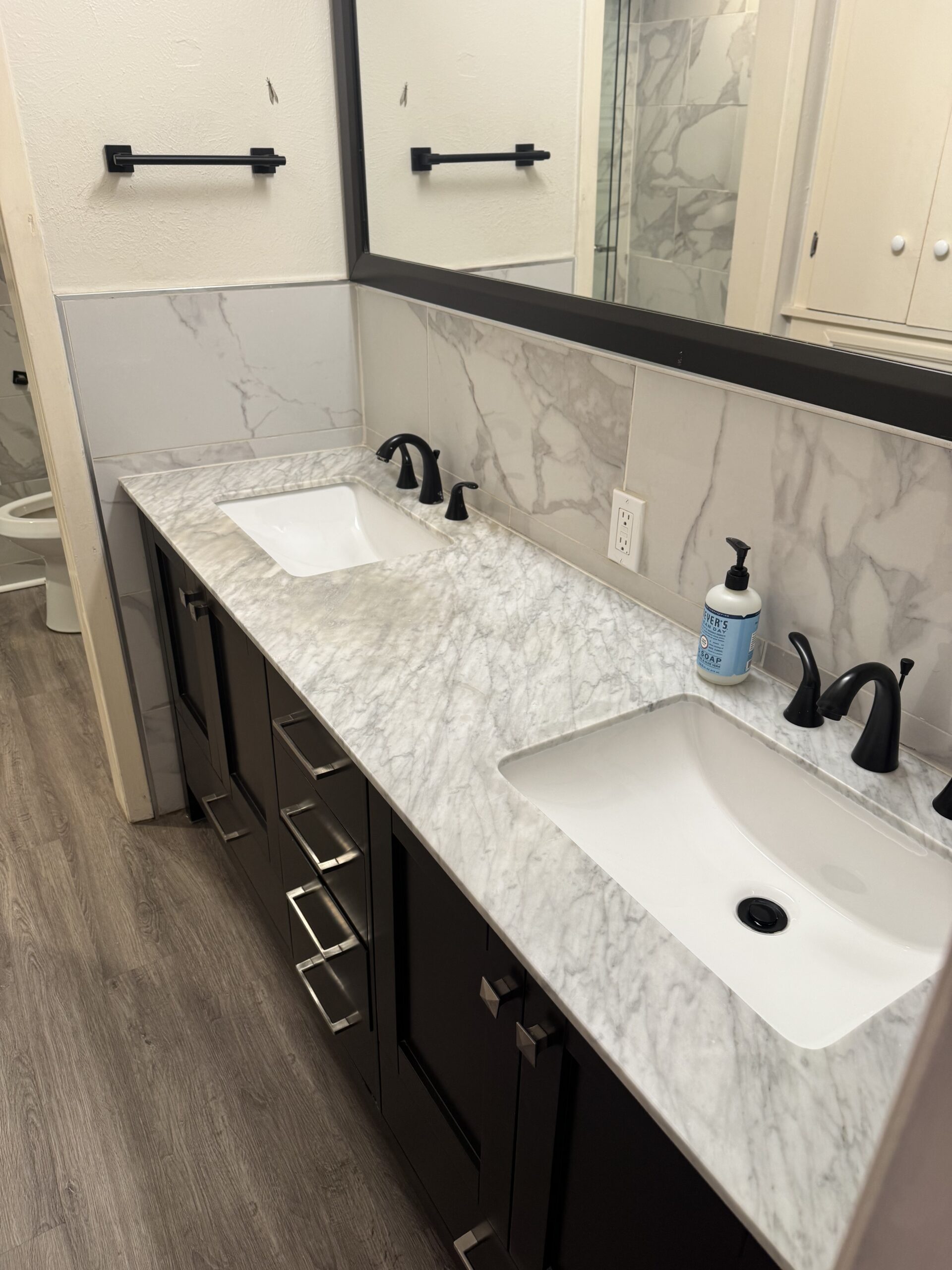 Clean vanity and countertop after professional residential cleaning service.