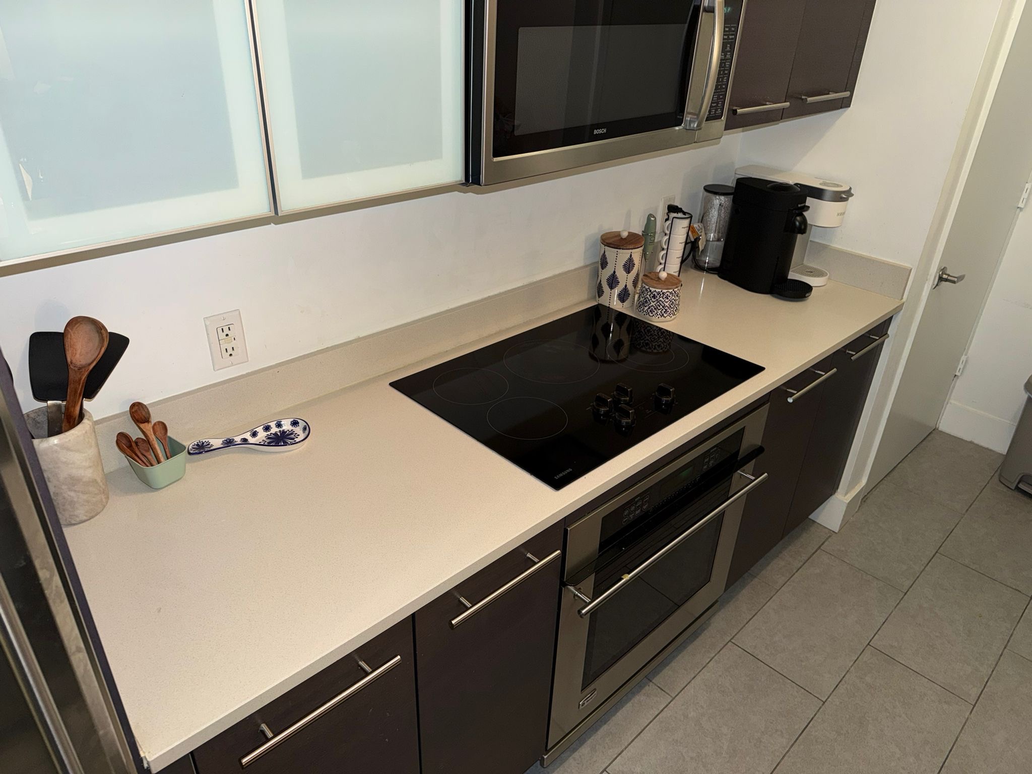 Spotless modern kitchen countertops cleaned by professional house cleaners in Dallas Fort Worth.